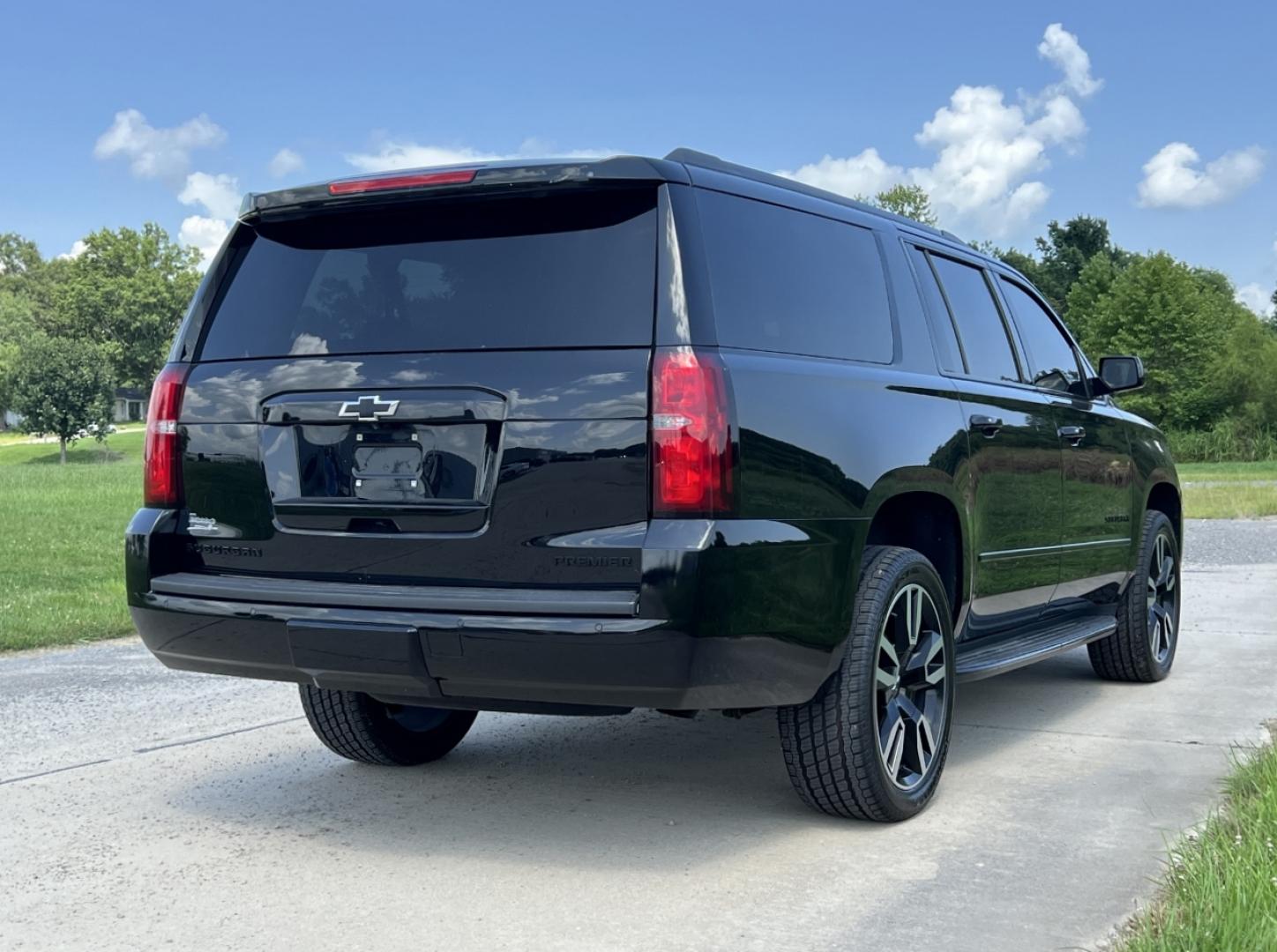 2019 BLACK /Black Leather Chevrolet Suburban Premier 4WD (1GNSKJKJ7KR) with an 6.2L V8 engine, Automatic transmission, located at 506 S. Kingshighway, Cape Girardeau, MO, 63703, (573) 235-5000, 37.294991, -89.553635 - 2019 Chevrolet Suburban 1500 Premier 92xxx miles 4 Wheel Drive 6.2L V8 Automatic Leather 3rd Row Navigation Rear Entertainment Power/Heated/Cooled Seats Heated Rear Seats Heated Steering Wheel Backup Camera Bluetooth Cruise Power Windows/Locks/Mirrors We have financing available and - Photo#13