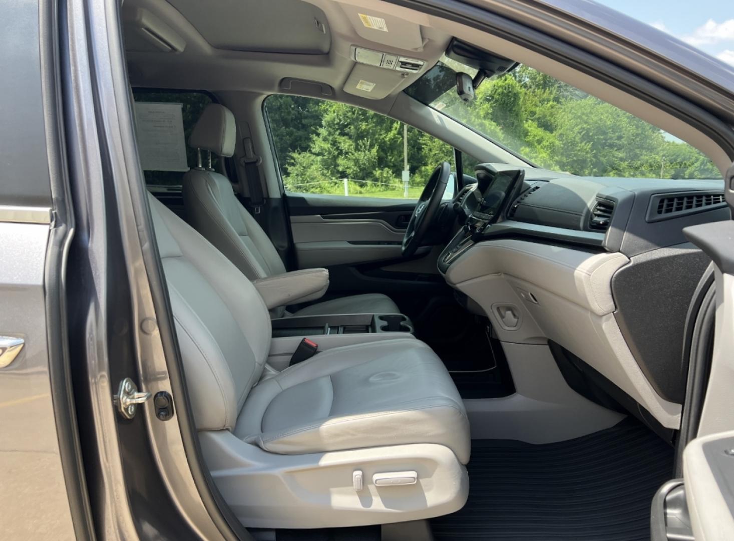 2019 GRAY /Gray Leather Honda Odyssey EX-L (5FNRL6H75KB) with an 3.5L V6 engine, Automatic transmission, located at 506 S. Kingshighway, Cape Girardeau, MO, 63703, (573) 235-5000, 37.294991, -89.553635 - 2019 Honda Odyssey EX-L 87xxx miles Front Wheel Drive 3.5L V6 Automatic Leather 3rd Row Navigation Rear Entertainment Power/Heated Seats Backup Camera Sunroof Bluetooth Remote Start Cruise Power Windows/Locks/Mirrors We have financing available and we accept trades! Fill out a credit - Photo#19